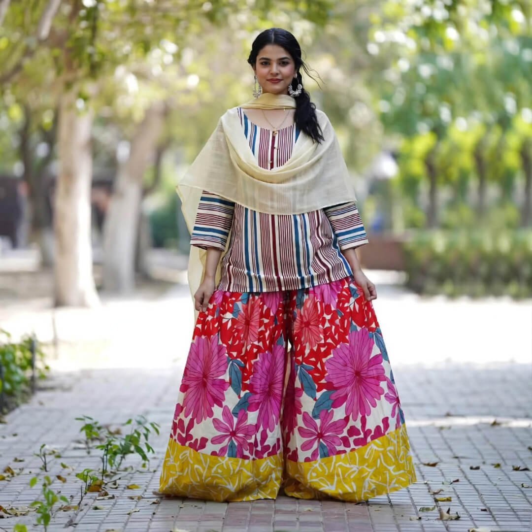 Spring Outfit Ideas That Scream Fresh and Fabulous Striped kurta, floral palazzos, solid dupatta in park